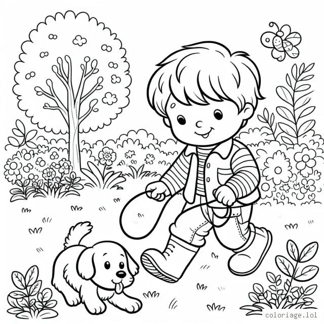 Un petit garçon qui joue au jardin avec son chien
